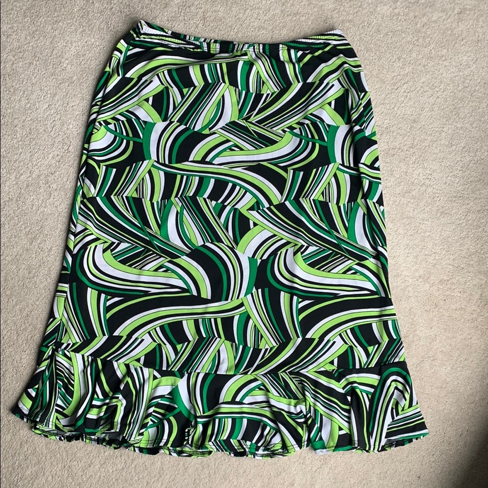 Geometric print skirt. Just past knee length with a flirty ruffle. Size small.